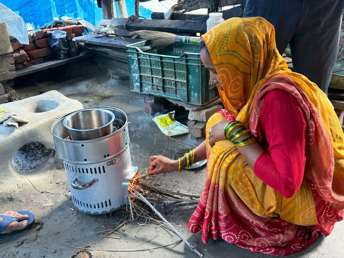 A household participant using an improved cookstove