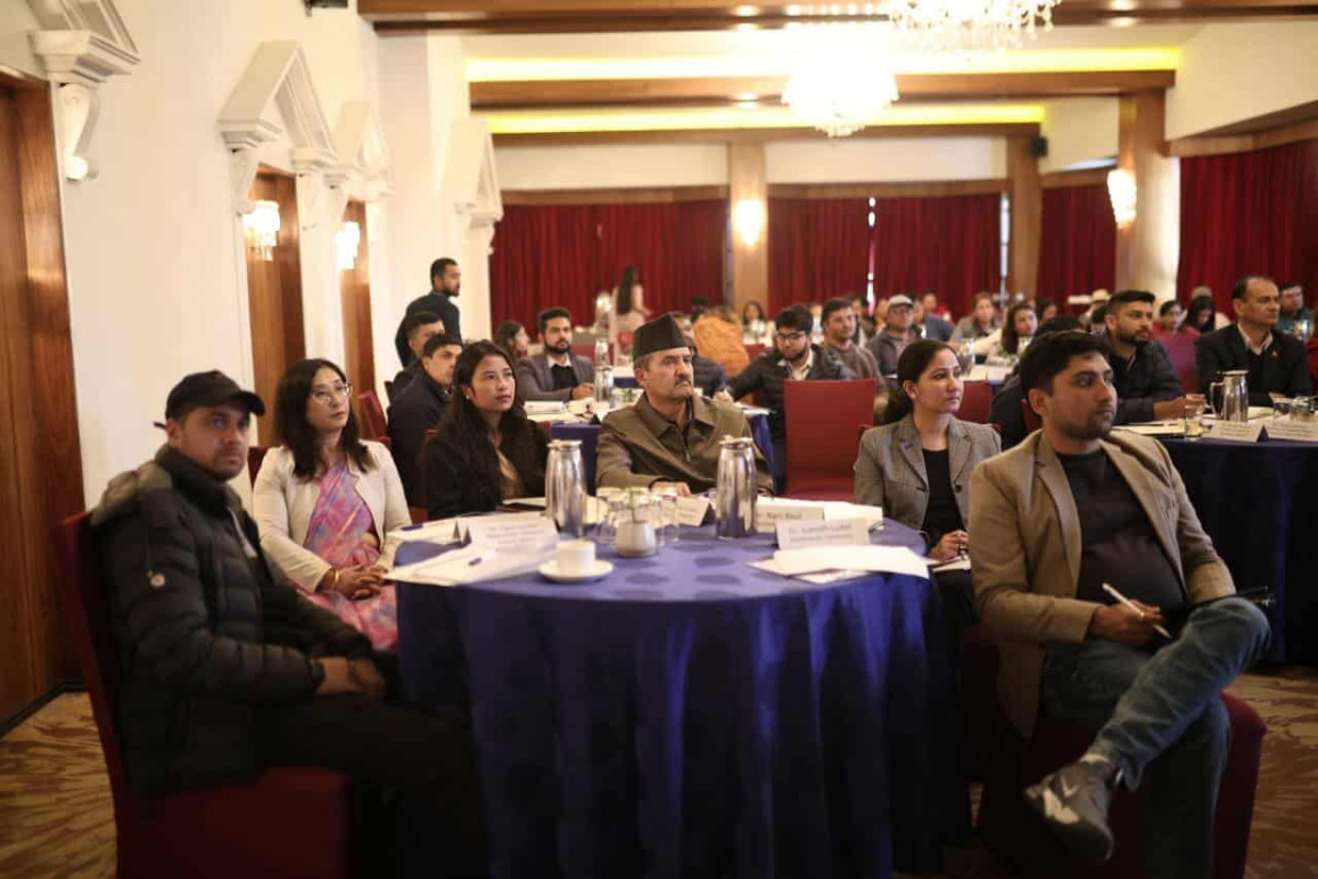 Participants seated at a national carbon-emissions consultation