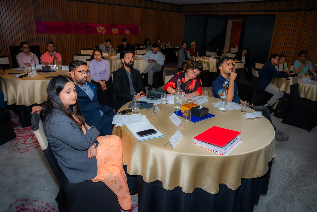 Participants discussing the clean-cookstove initiative at a stakeholder meeting